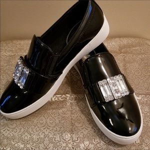 Michael Khors black slip on sneakers with jewel detail